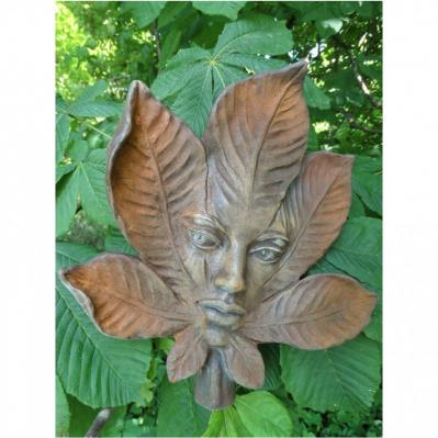 Steinfigur Kastanie Blatt mit Elfengesicht Steinguss Höhe ca. 30 cm Rostfarben