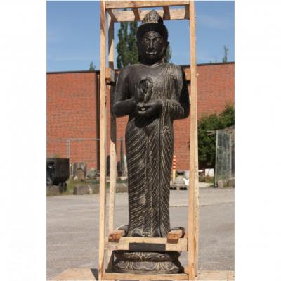 Steinfigur stehender Buddha Rad der Lehre drehend